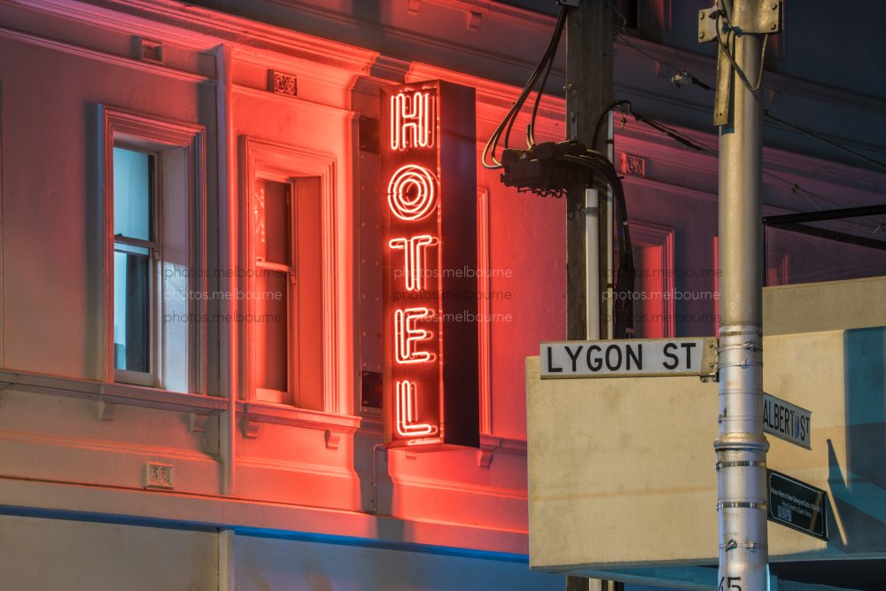 Neon hotel sign on Lygon Street - Photos | Melbourne